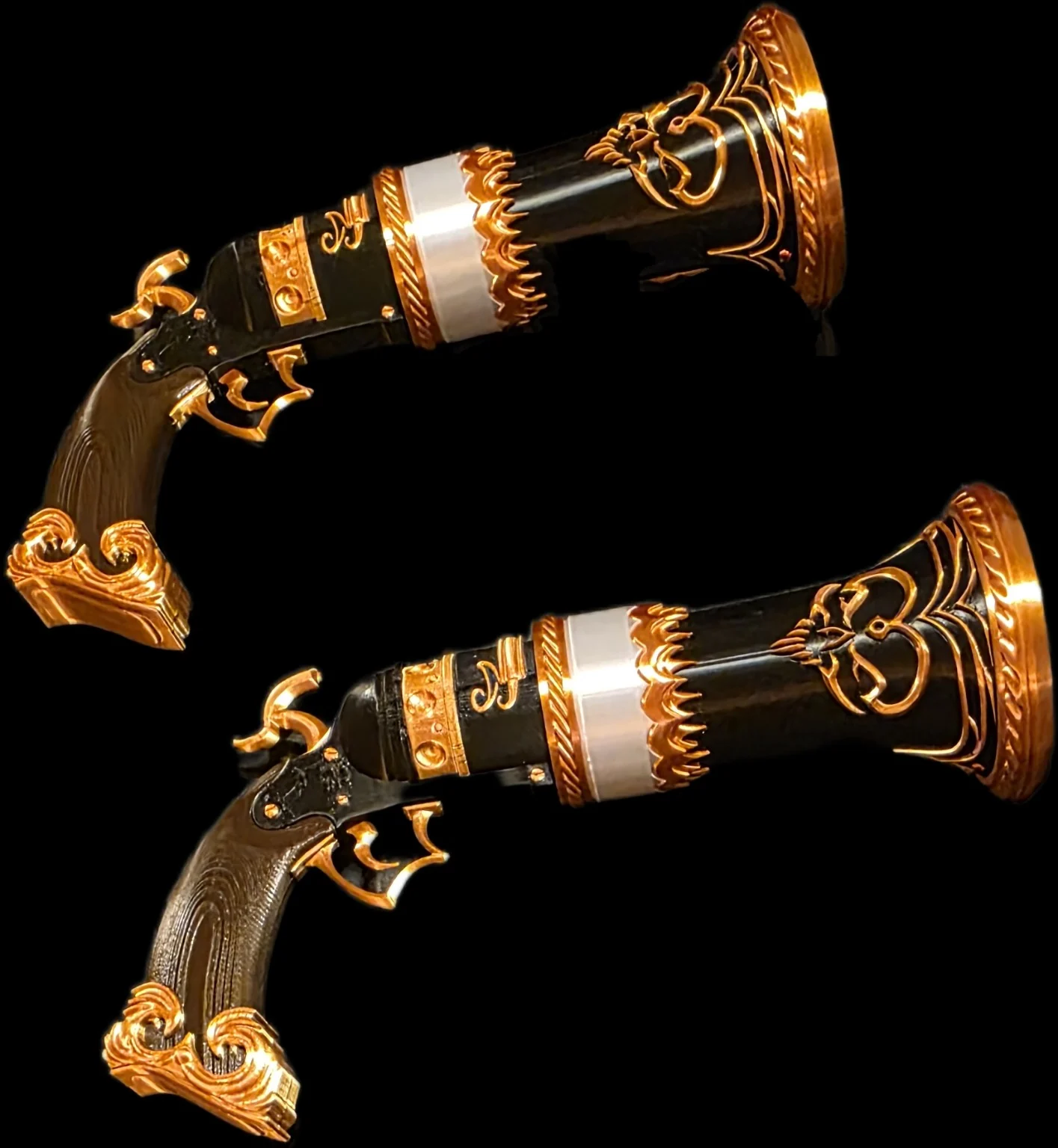 Pair of black and gold cosplay props